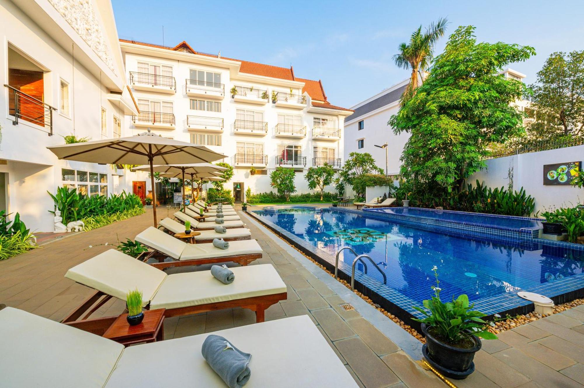 Sala Siem Reap Hotel Exterior foto The hotel's pool